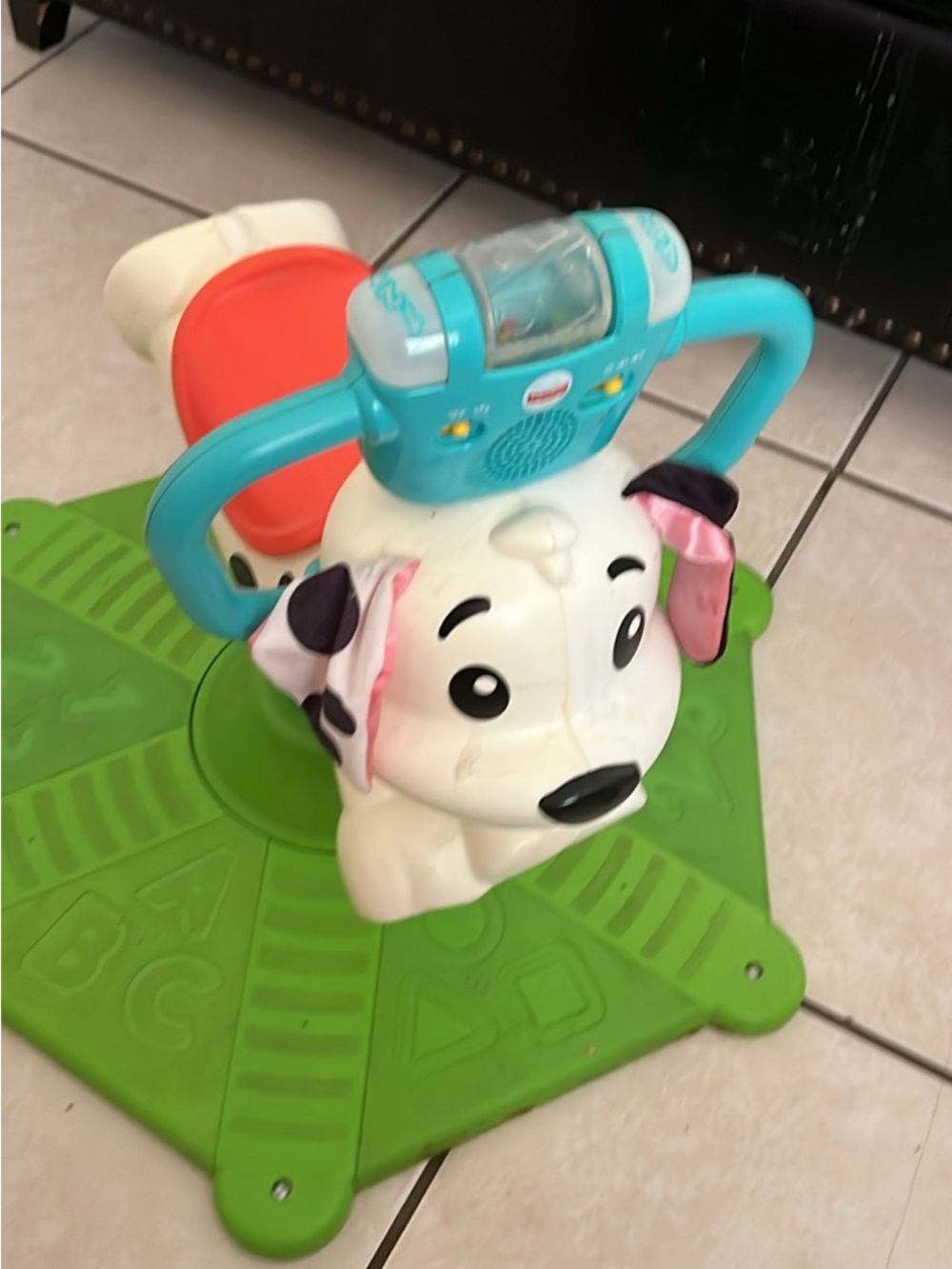 Fisher-Price Teal, White, Pink and Green Puppy Ride-On